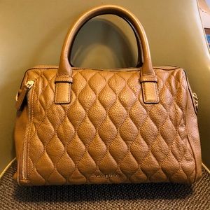 Vera Bradley toffee colored leather quilted handbag.No shoulder strap. Like new!